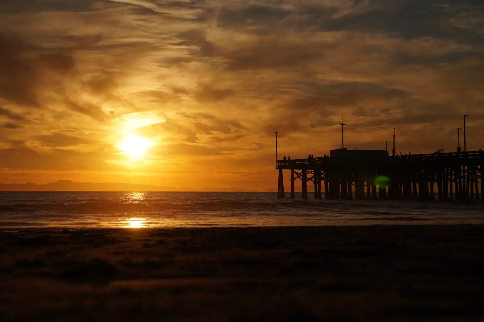 Sunset over the Newport Beach pier in Orange County, California
